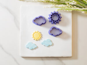 sun and clouds clay cutter