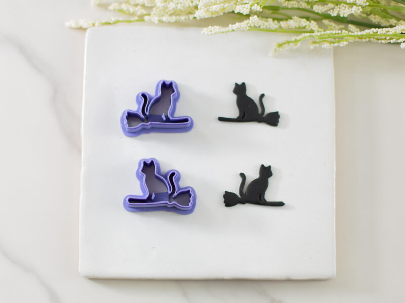 cat on a broomstick clay cutter